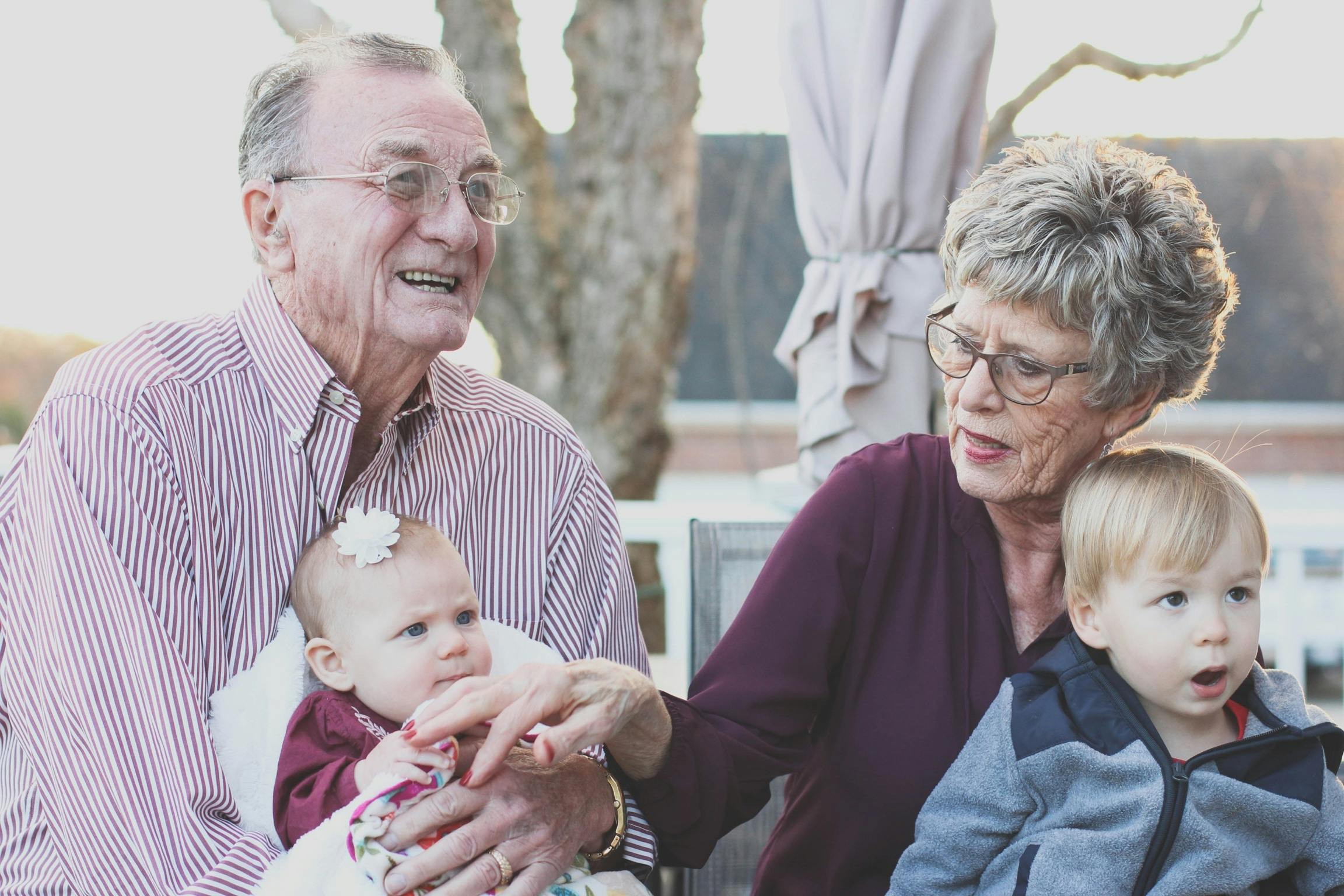 An advisor reviews estate planning documents with a senior couple